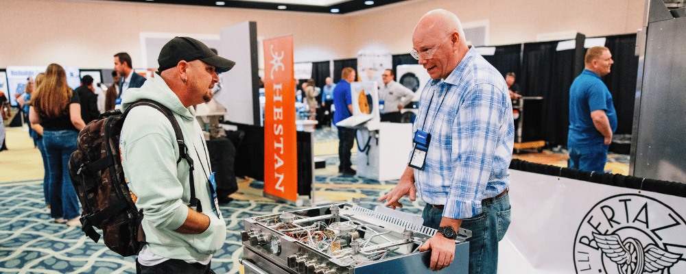 man giving a product demonstration during an expo