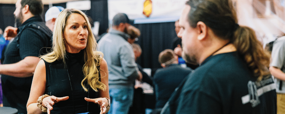 woman networking during a trade show