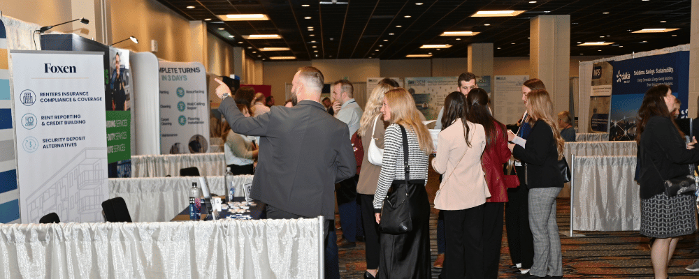 group of attendees walking around a trade show expo