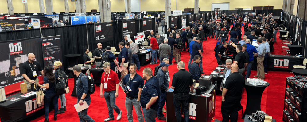 group of corporate event attendees walking around a expo