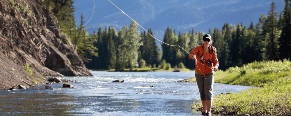 Woman fly fishing in Wyoming