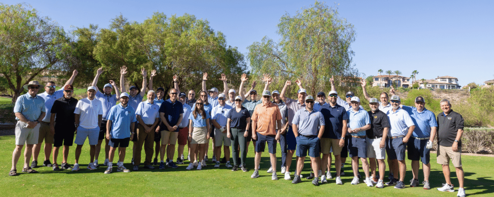 group of franchise owners golfing