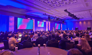 group of franchisees watching a conference