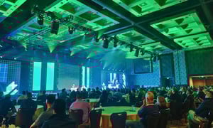 group of attendees watching a franchise convention