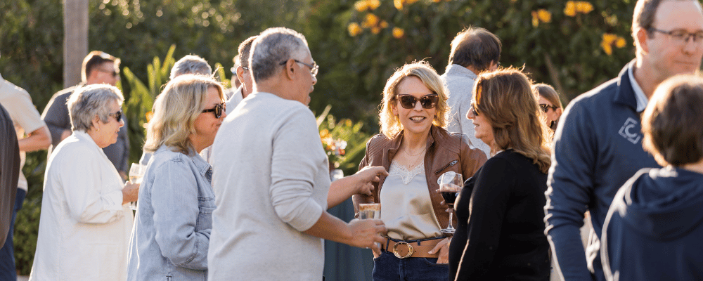 group of franchisees networking during an incentive trip