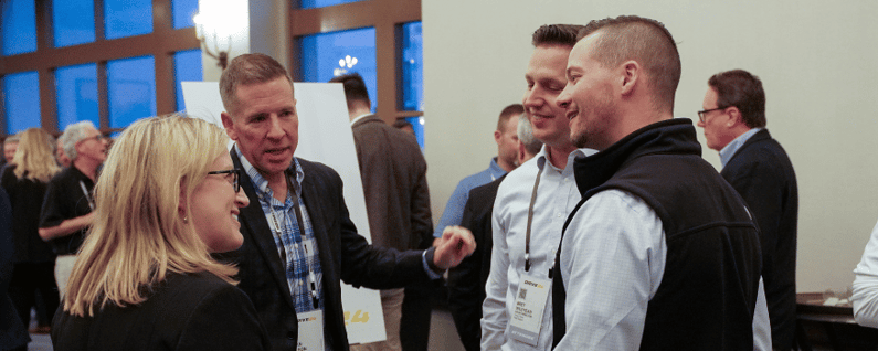 group of attendees networking