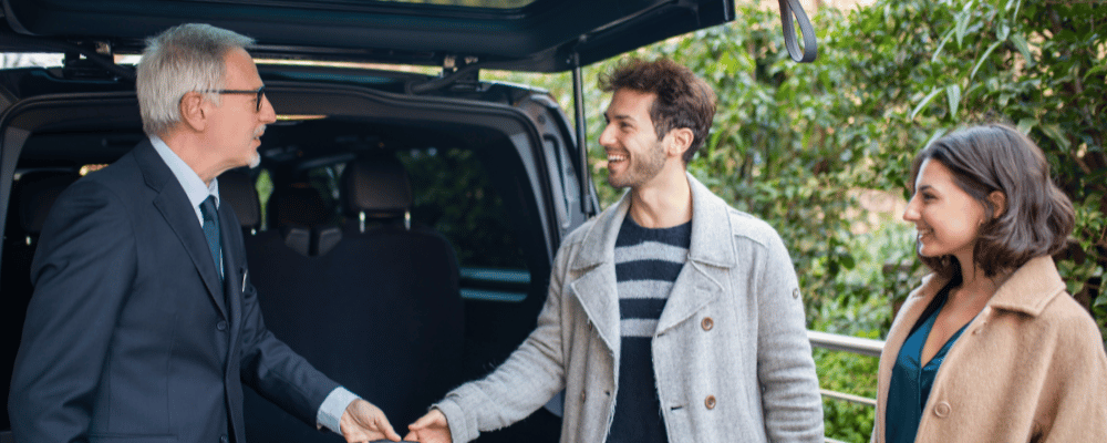 two event attendees using hotel shuttle transportation services