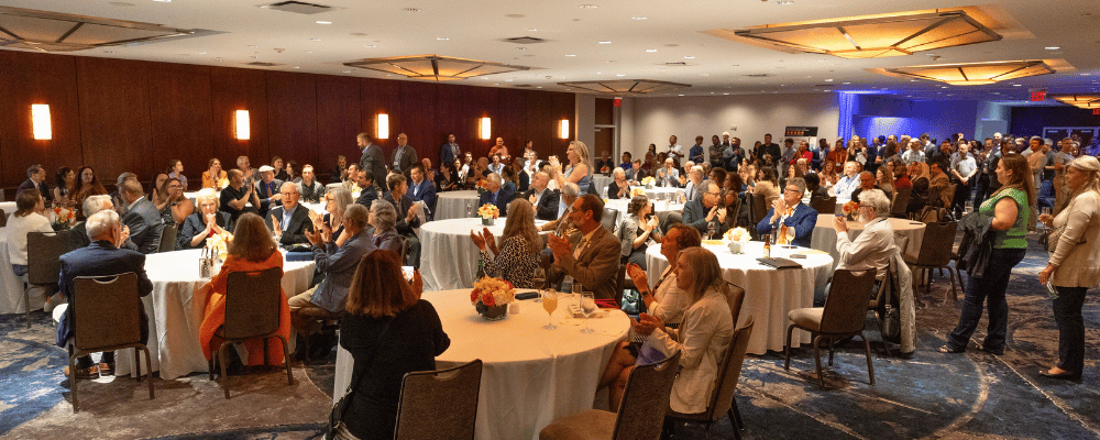 group of event attendees at a networking dinner