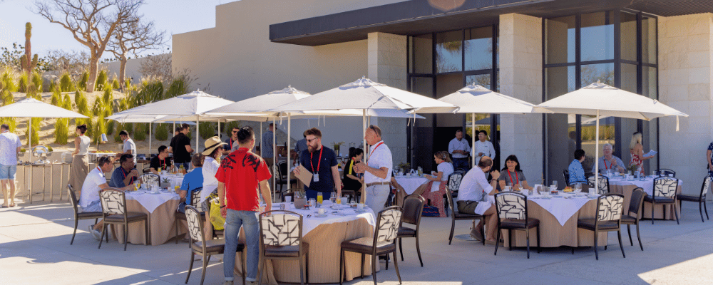 group of attendees networking over breakfast