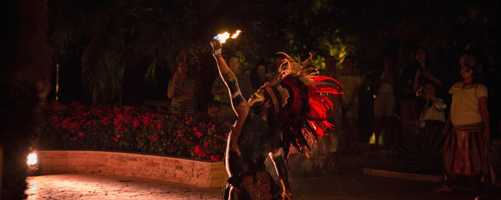 fire dancer performs at incentive travel program