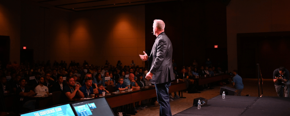 keynote speaker giving a presentation at a corporate conference