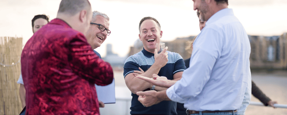 group of attendees networking at a corporate event conference