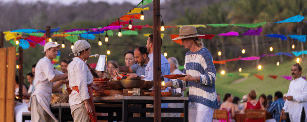 woman choosing food at an event buffet