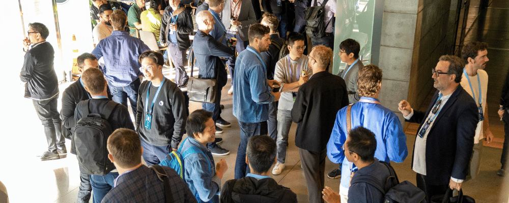 group of attendees networking at a conference