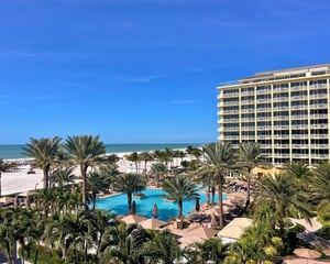 outside view of pool and beach of JW Orlando