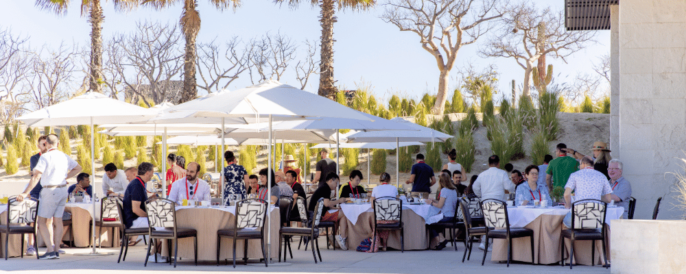 group of incentive trip attendees enjoying breakfast in cabo san lucas