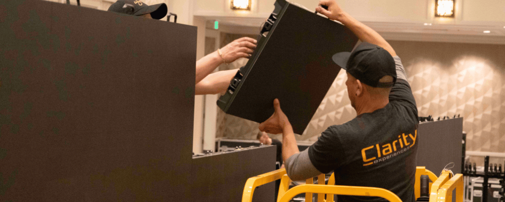 A/V producer loading in equipment for a conference