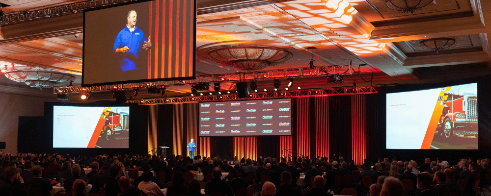 CEO giving a presentation at a corporate event