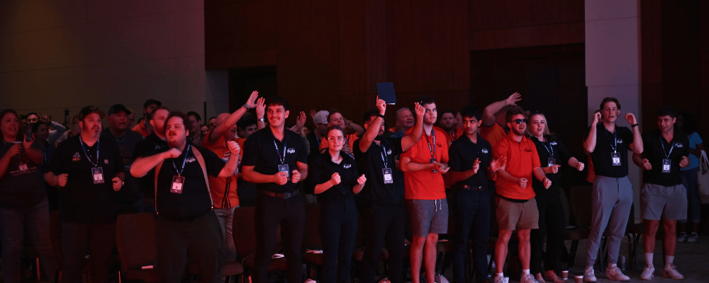 group of attendees watching a conference
