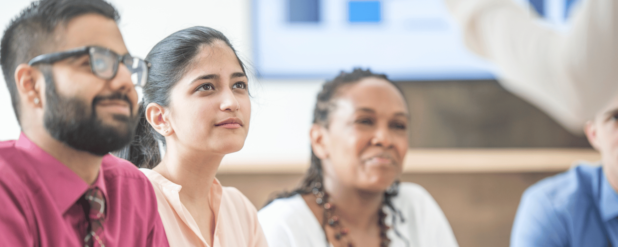 group of people learn from their coworker at a sales kickoff