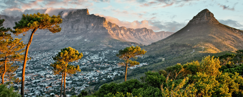 executive retreat in south africa with a city nestled among majestic mountains