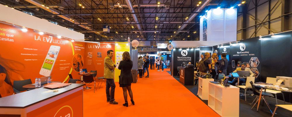 attendees walking around a trade show expo