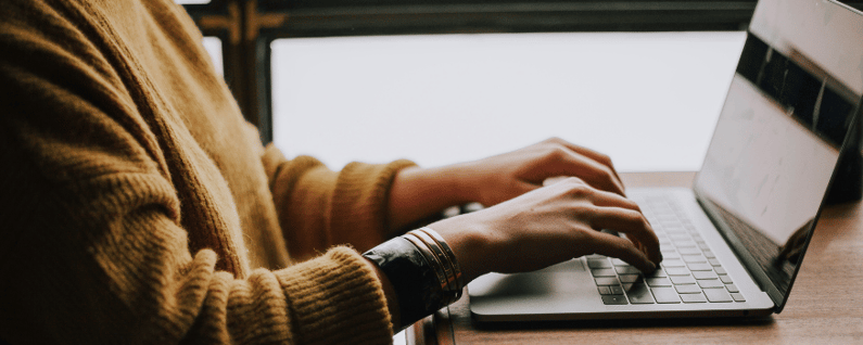 vendor typing on computer