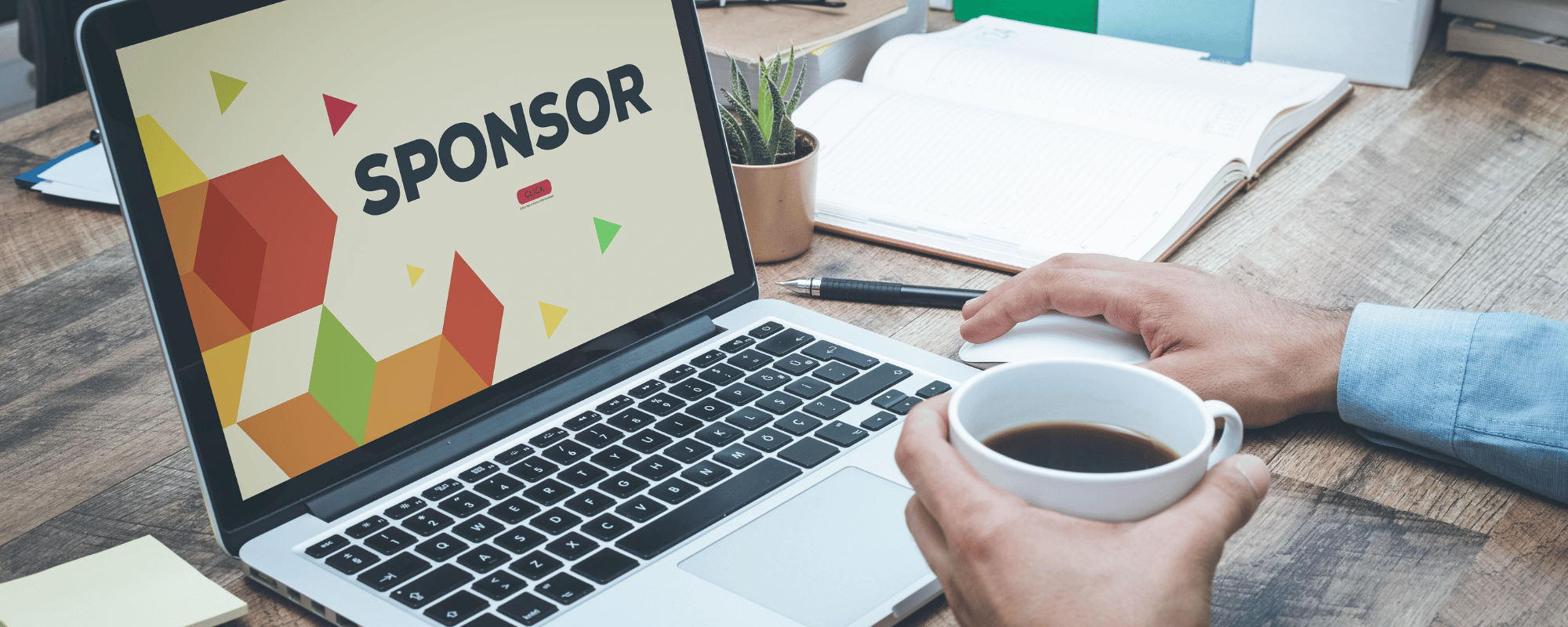 man at a desk looking at a sponsorship summary template on computer
